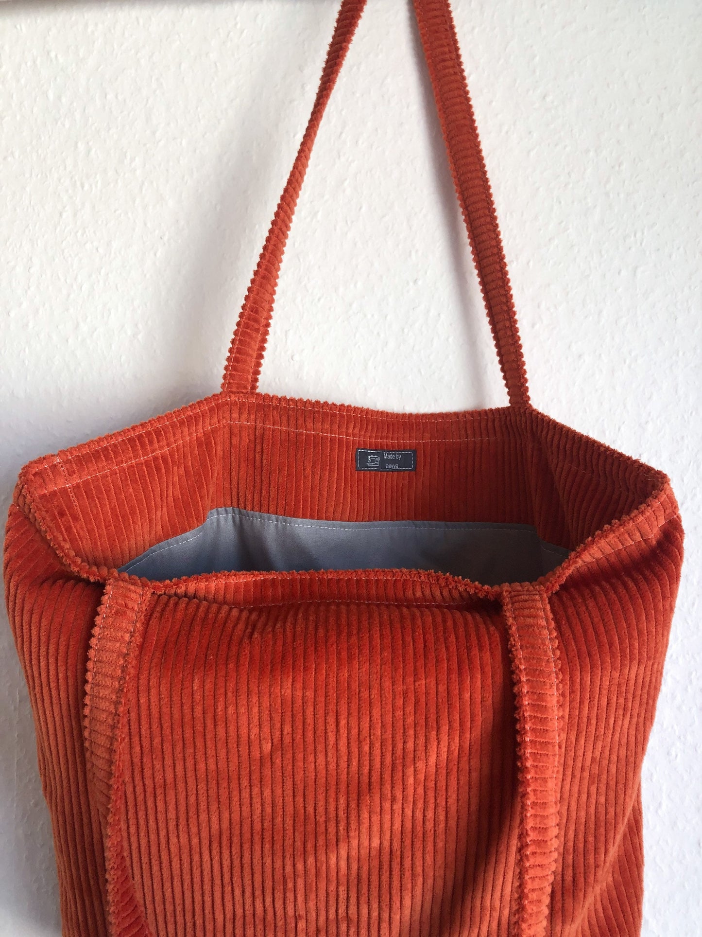 Shopper groß aus Cord in orange mit Reißverschluss und Innentasche